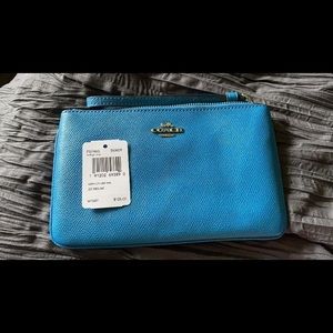 Brand new bright blue Coach wristlet purse wallet